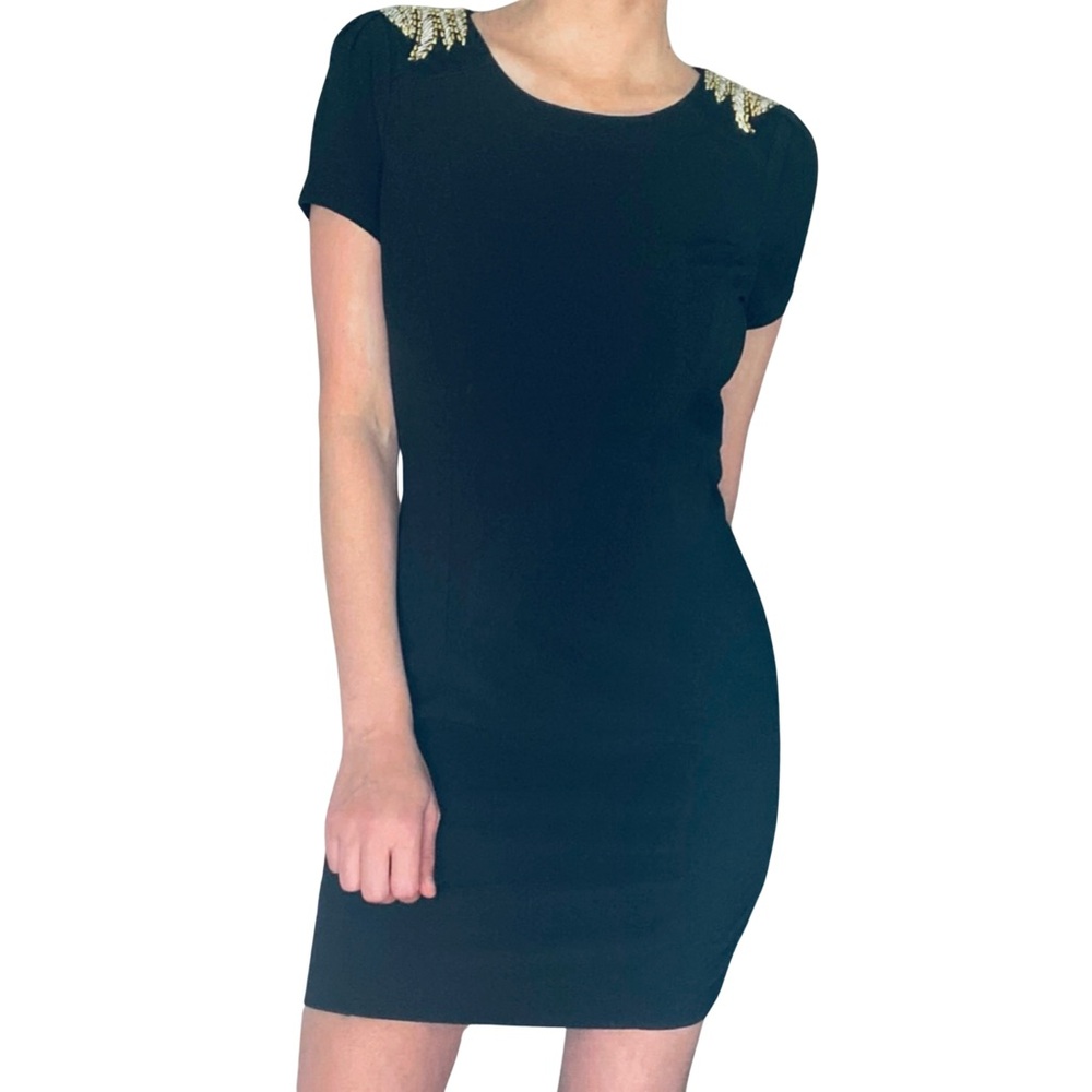 Black Open Back Mini Dress with Bead Embellishments. The perfect party dress.